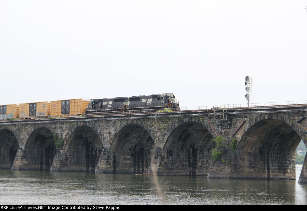 NS 6303 brings freight from the Sunbury line over Rockville Bridge